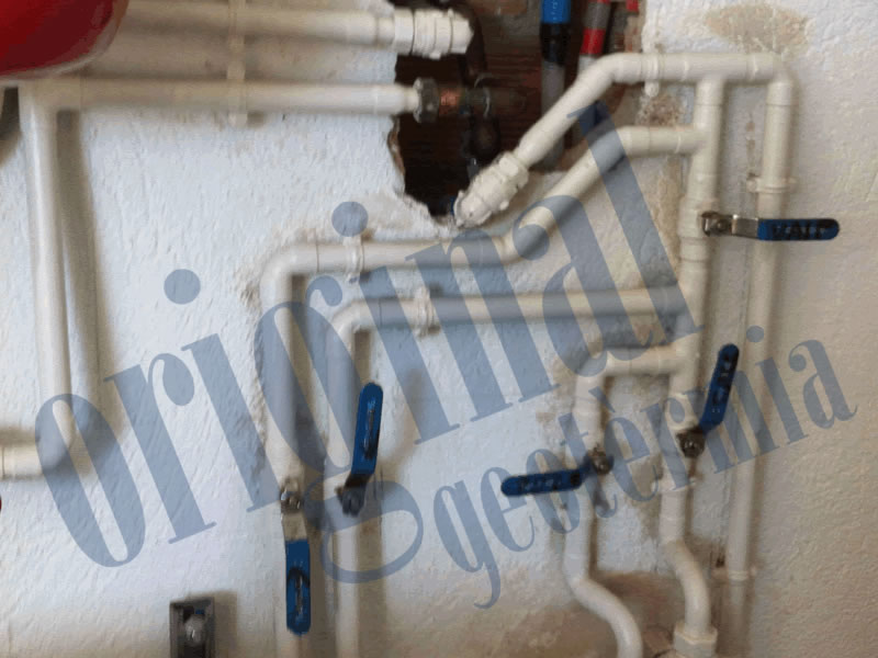 sala de màquines, tram de tuberíes a repara :: reparació d'una instal·lació de geotèrmia d'un habitatge